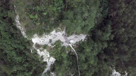 Aerial-top-view-of-Sugana-Valley,-with-drone-rotating-while-ascending