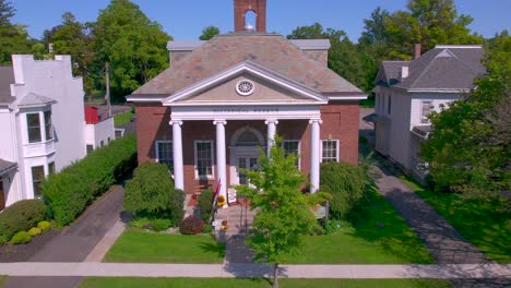 drone shot pushing in on the historical museum and research library for the ontario county research society in canandaigua new york