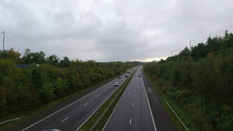 m motorway freeway with cars and haulage trucks
