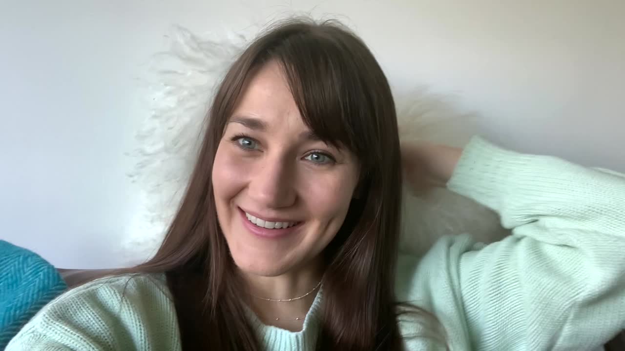 Caucasian Woman Listening And Responding To A Video Chat