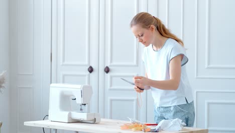 woman sewing at home