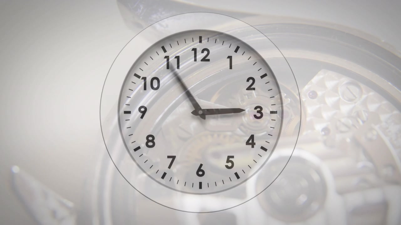 Animation of clock moving over clock mechanism