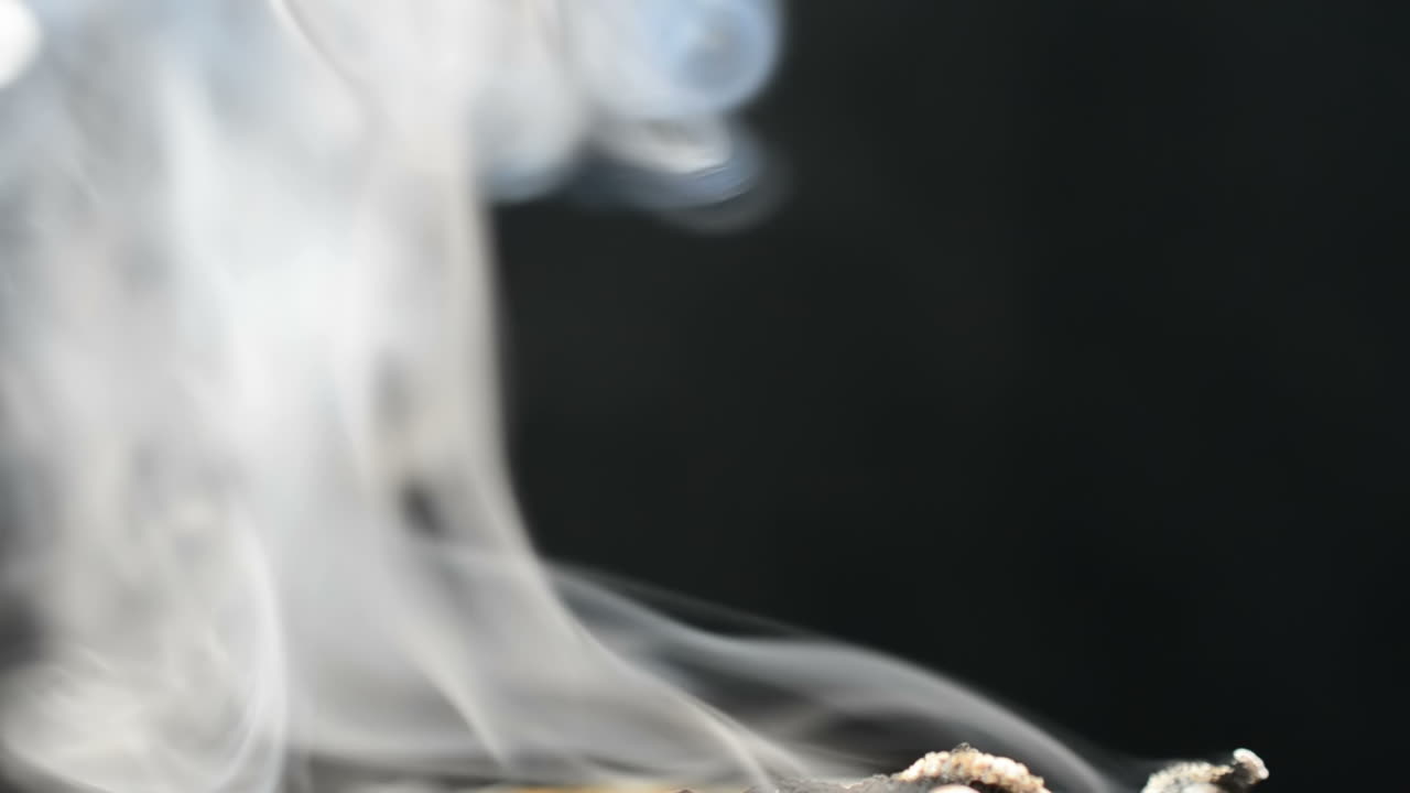 Gray smoke on a black background. Smoke and background