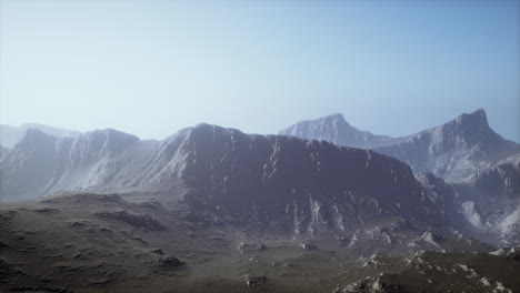 rocks and mountains in deep fog