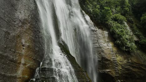 shine falls waterfall in hawkes bay, new zealand nature forest - low angle