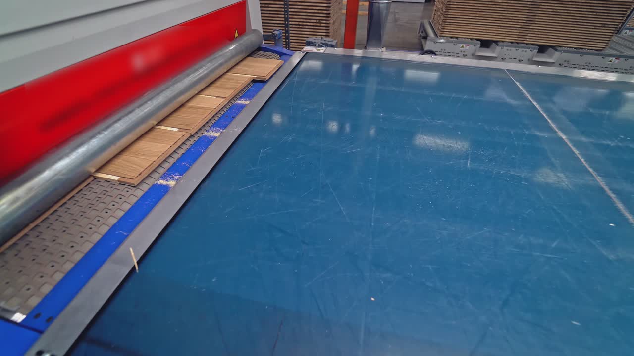 Modern Production of parquet board. Industrial production line.