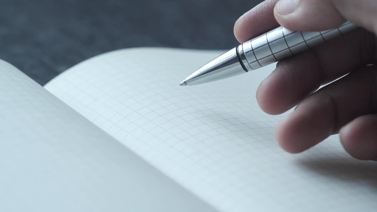 Hand writing in a notebook