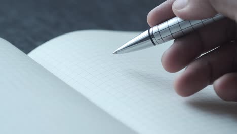 hand writing in a notebook
