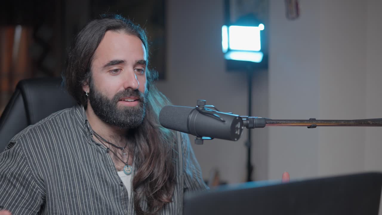 Man Recording a Podcast or Interview at Home