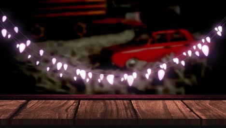 Animation-of-fairy-lights-over-wooden-boards