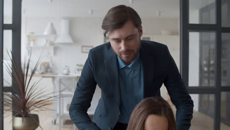 Handsome-man-massaging-woman-shoulders-in-slow-motion.-Couple-hugging-together