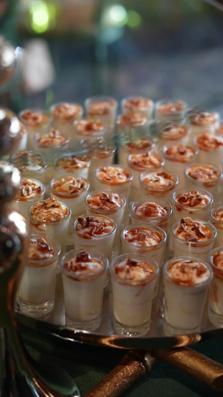 A table contains dessert cups, high angle shot