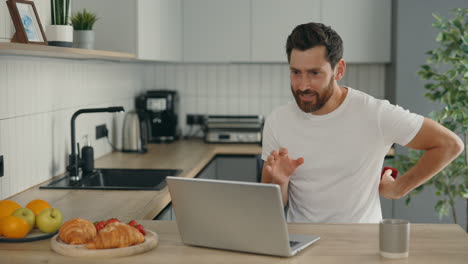 man proposing during video call