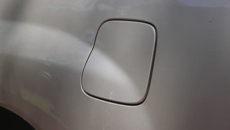 fuel cap door of a motor vehicle opening