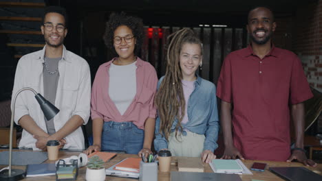 happy diverse team at a modern office
