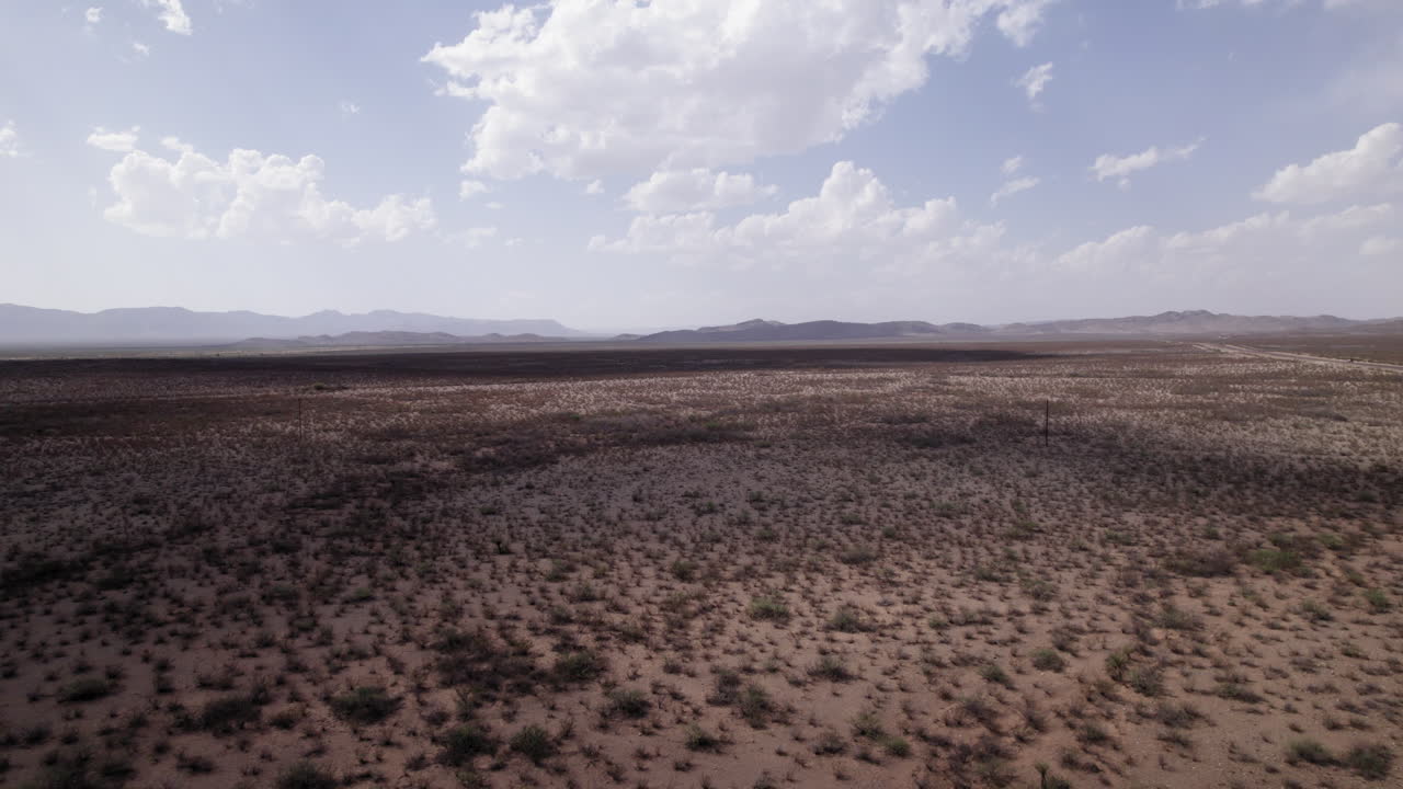 The West Texas Chihuahuan Desert with puffy clouds in the Big Bend Region, aerial view