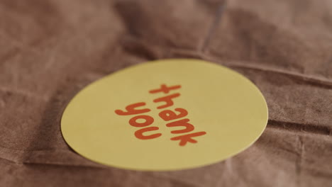 applying a thank you sticker