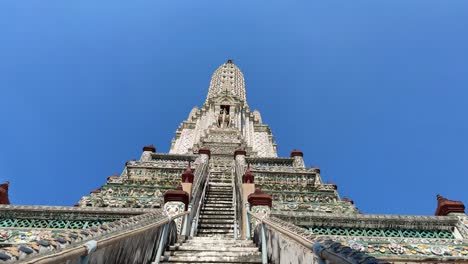 wat arun buddhist temple of dawn establish shot stairs main tower bangkok