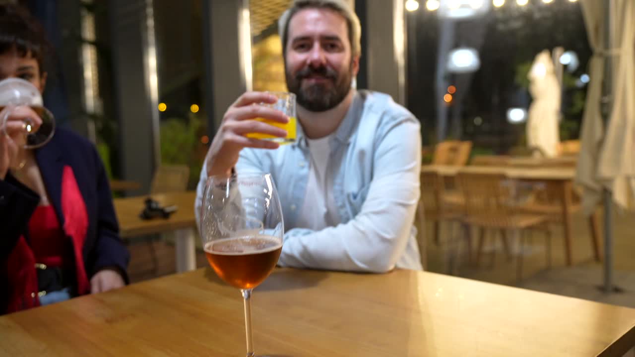 People enjoying drinks at a restaurant