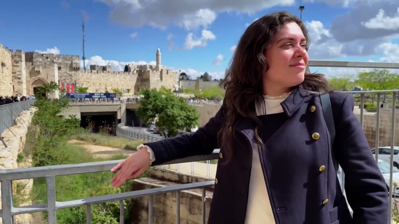 Woman Meditating on Jerusalem City Viewpoint