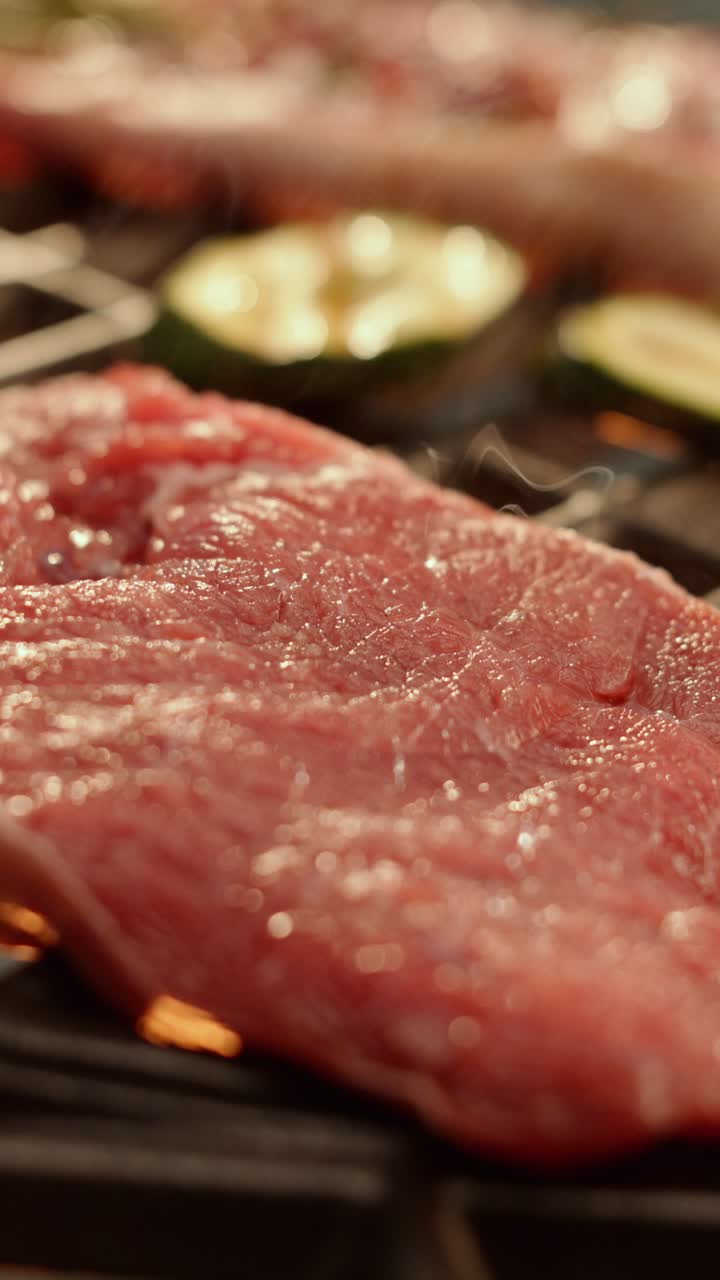 Grilling meat and zucchini