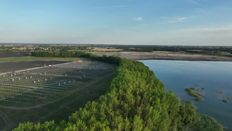 Aeria-view-of-Osadnik-Gajówka-artificial-lake-in-Gmina-Przykona,-within-Turek-County