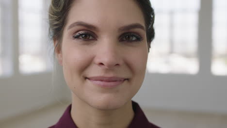 close up portrait of beautiful young woman smiling confident at camera pretty caucasian female perfect skin