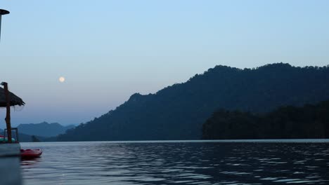 time-lapse of a sunset over a tranquil lake