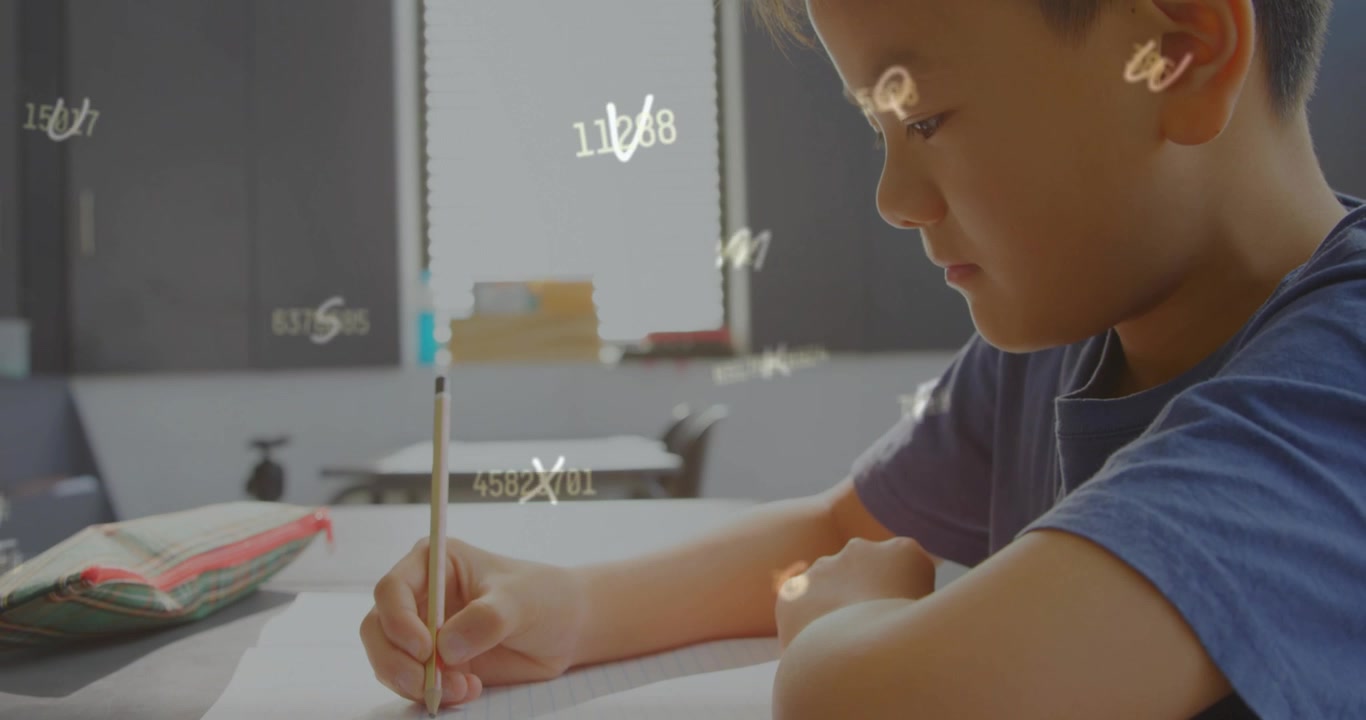 Writing student blue tee holding pencil on paper at school desk with animated overlay, copy space