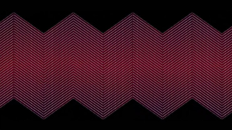 Анимация тонких красных параллельных зигзагообразных линий, медленно прокручивающихся по черному фону.