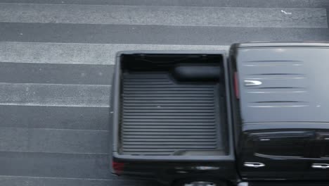 Top-view-of-the-zebra-crossing-area-with-people-crossing-the-street-in-Bangkok,Thaialnd