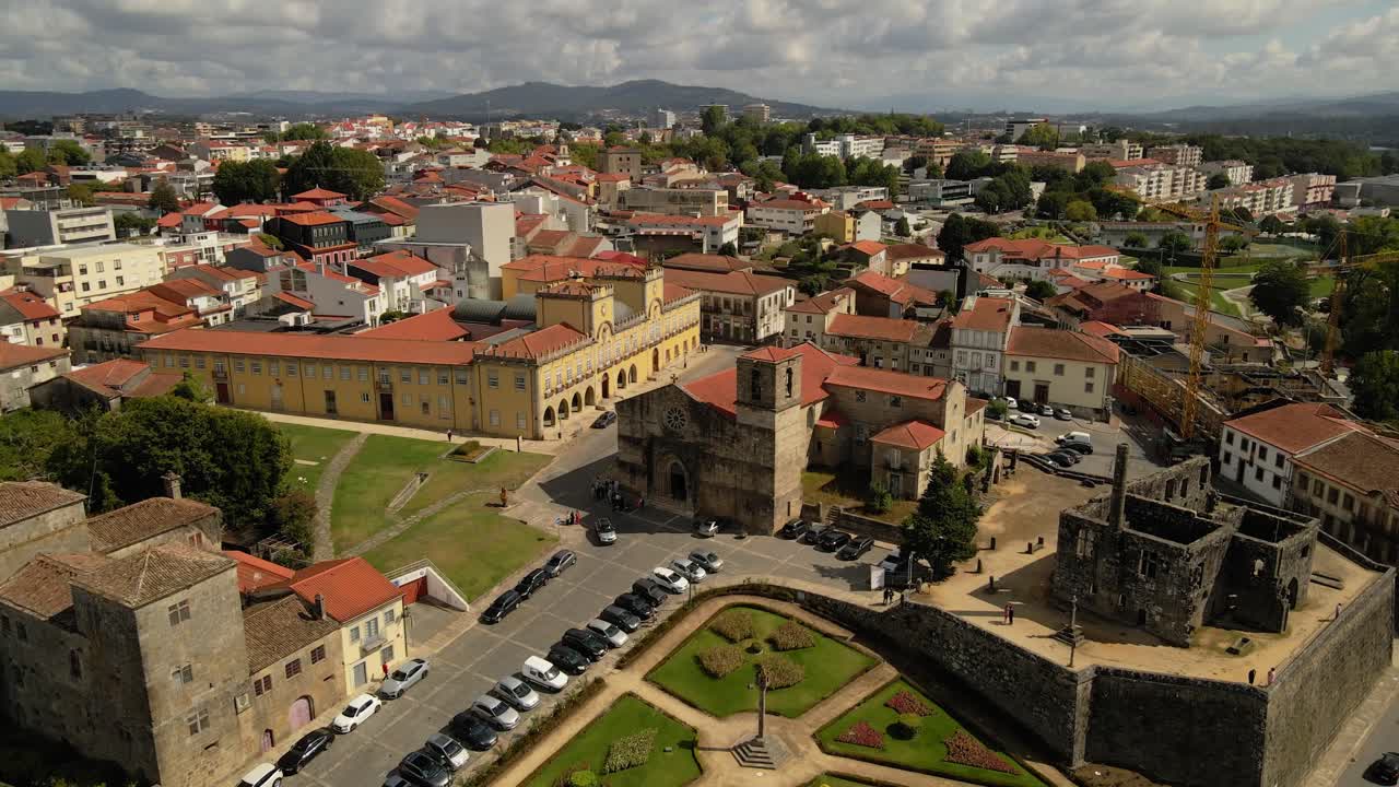 aerial - Barcelos old town showing medieval church and castle by the gardens