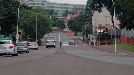morning side durban south africa base eye view of the center road with cars and buildings surrounding