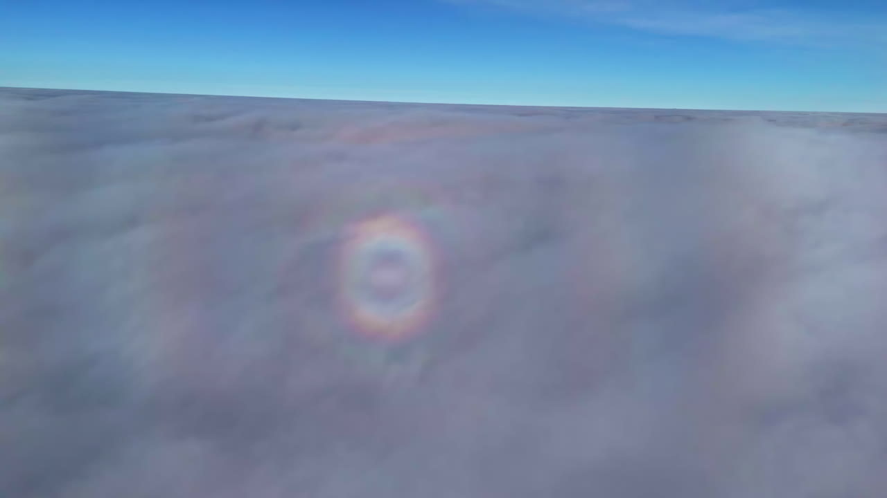 Abstract aerial of icy clouds and sun flare ring over muted blue tones and subtle natural textures, sky backdrop