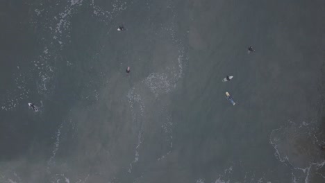 Overhead-looking-straight-down-on-surfers