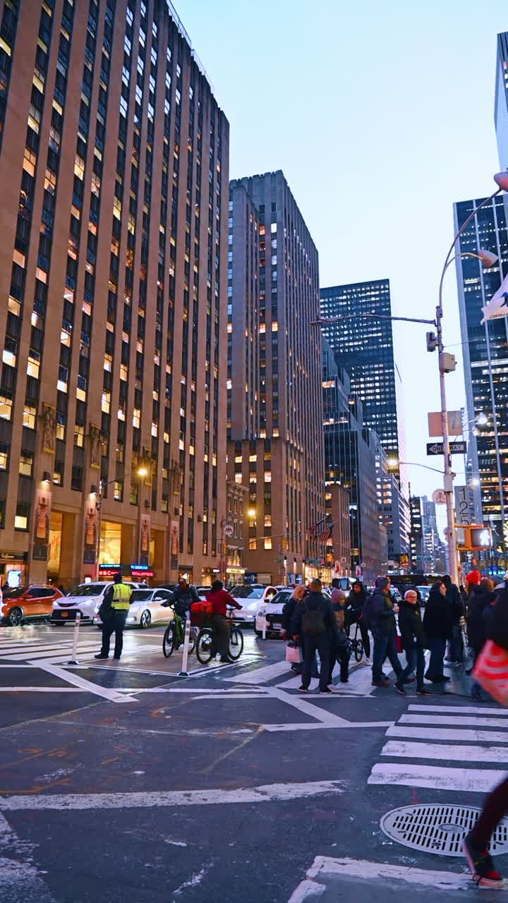 New York, USA, 20 December 2025: New York street bright with lights. Crowds gather at dusk in New York, enjoying the festive atmosphere and dazzling city lights in a vibrant urban setting