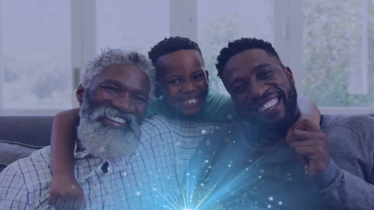 3-gen family showing joy on sofa child leaning in putting arms blue burst growing overlaying torso