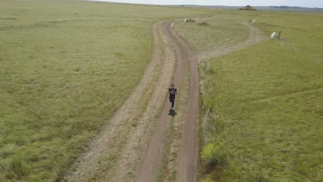 person running on a country road