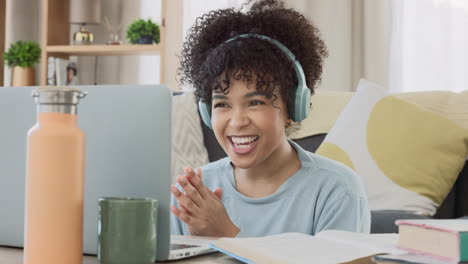 cheerful online tutor clapping her hands to