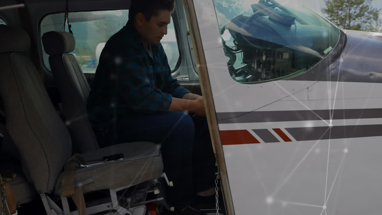 rede de ligações contra o piloto caucasiano sentado num avião privado