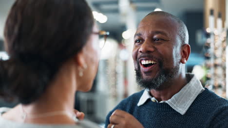 man and woman at optician's office