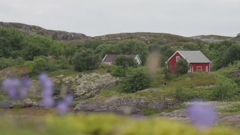 picturesque landscape of norwegian cabin houses on the mountain hill at daylight