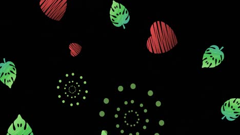 Animation-of-green-firework-explosions-with-green-leaf-and-red-heart-shapes-on-black-background