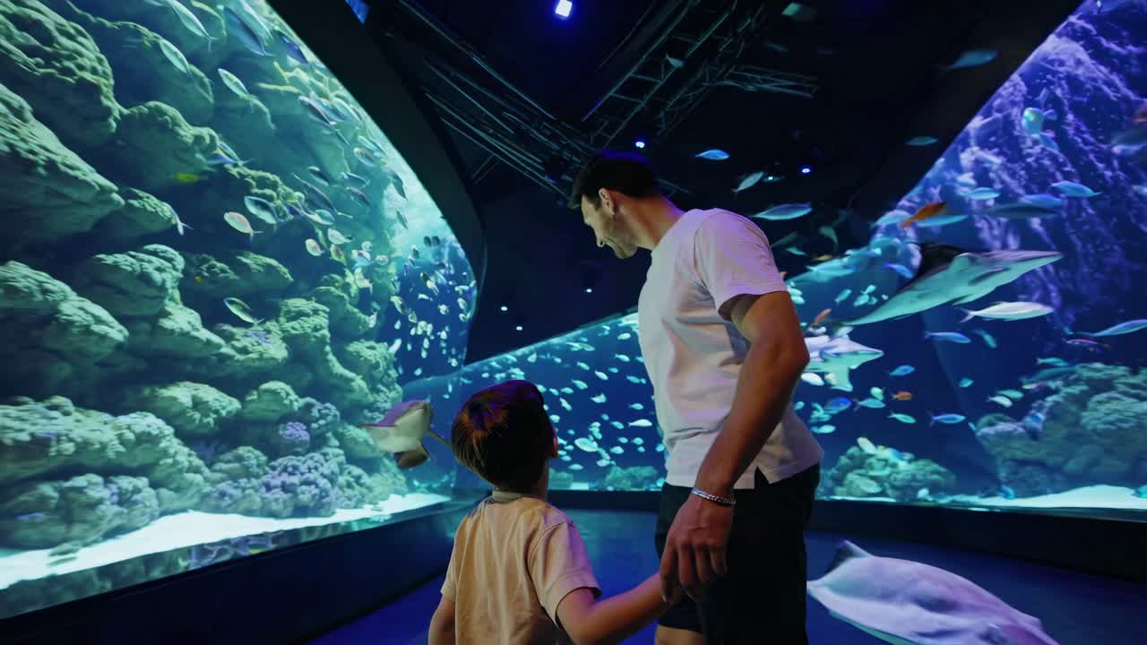 Father and Son at the Aquarium