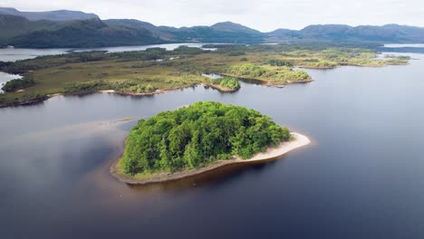 aerial over of isle maree in loch maree in scotland