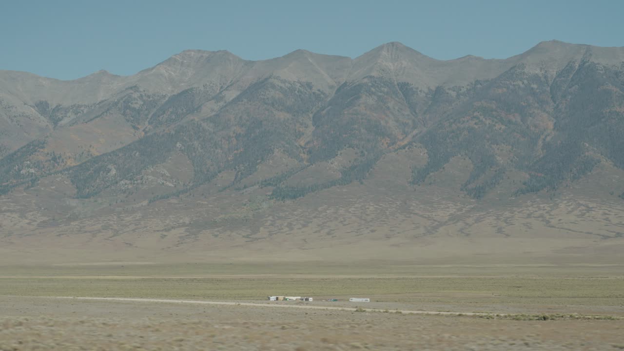 Scenic Mountain Landscape with Caravans