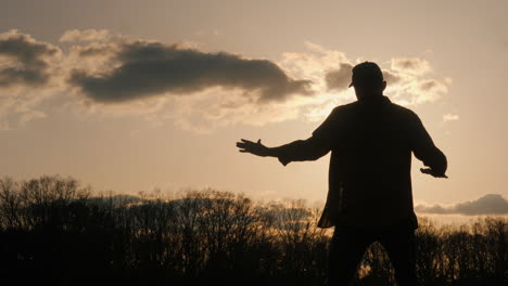 man enjoying sunset in nature