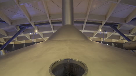 Close-up-view-of-a-metal-mash-tun,-the-vat-in-which-malt-is-mashed,-in-a-modern-Scottish-whisky-distillery