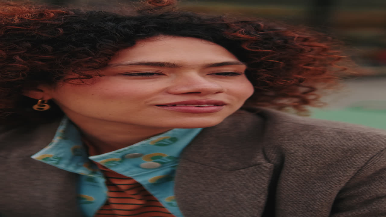 Thoughtful Young Woman Contemplates in City