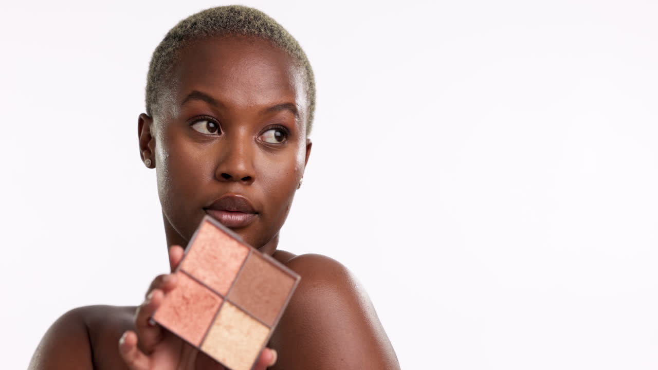 Beauty, makeup and woman with palette in studio